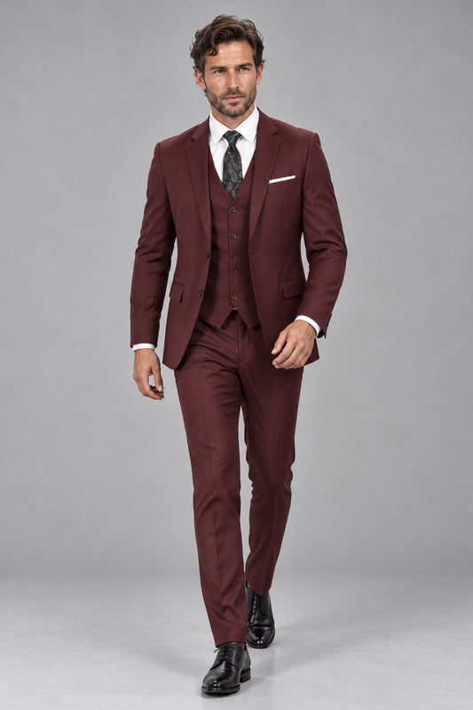 Savile Men's Burgundy 3-piece suit full length dynamic walking shot showcasing elegant drape and silhouette