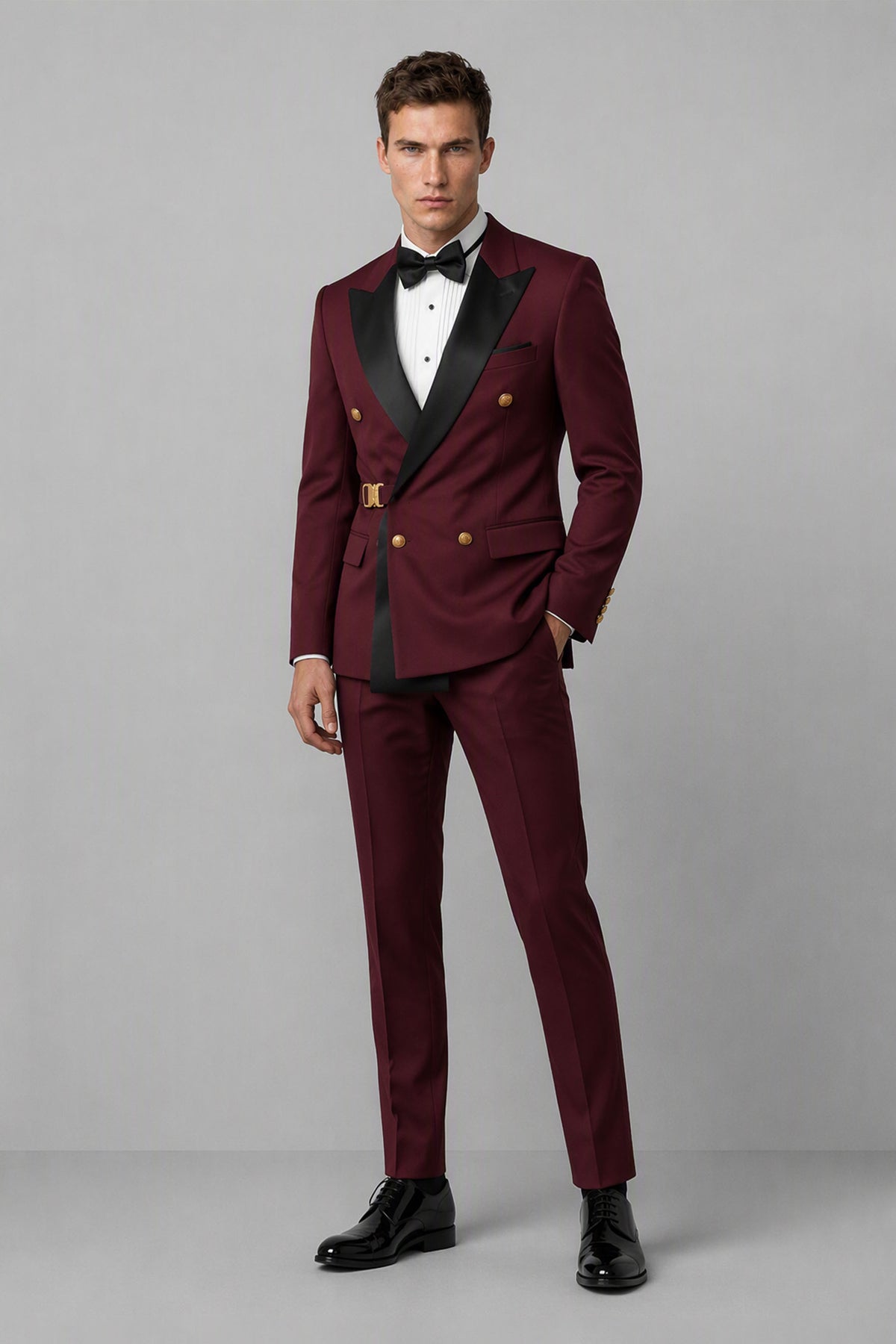 Savile burgundy two-piece men's suit full front view with matching trousers and black peak lapels