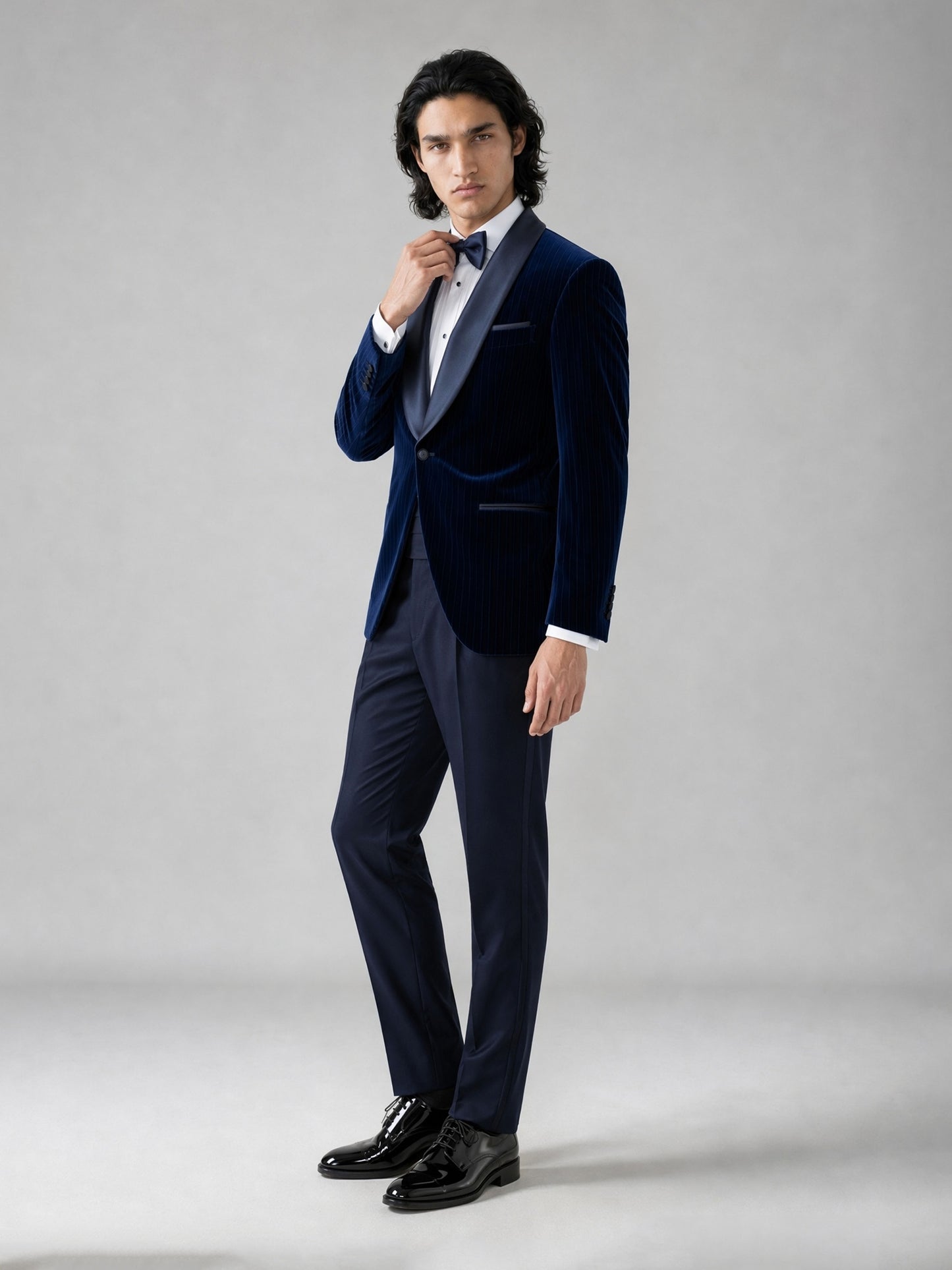 Savile GA0062 navy velvet tuxedo set – back three-quarter view showing velvet texture, shawl lapel and slim navy trousers