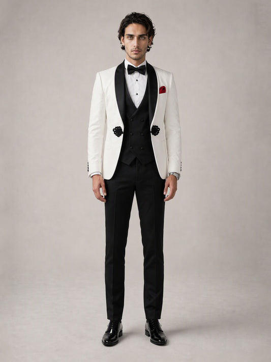 Savile GA0137 ivory tuxedo suit - three-quarter front view showing black velvet shawl lapel and sequin appliqué detail with patent Oxford shoes