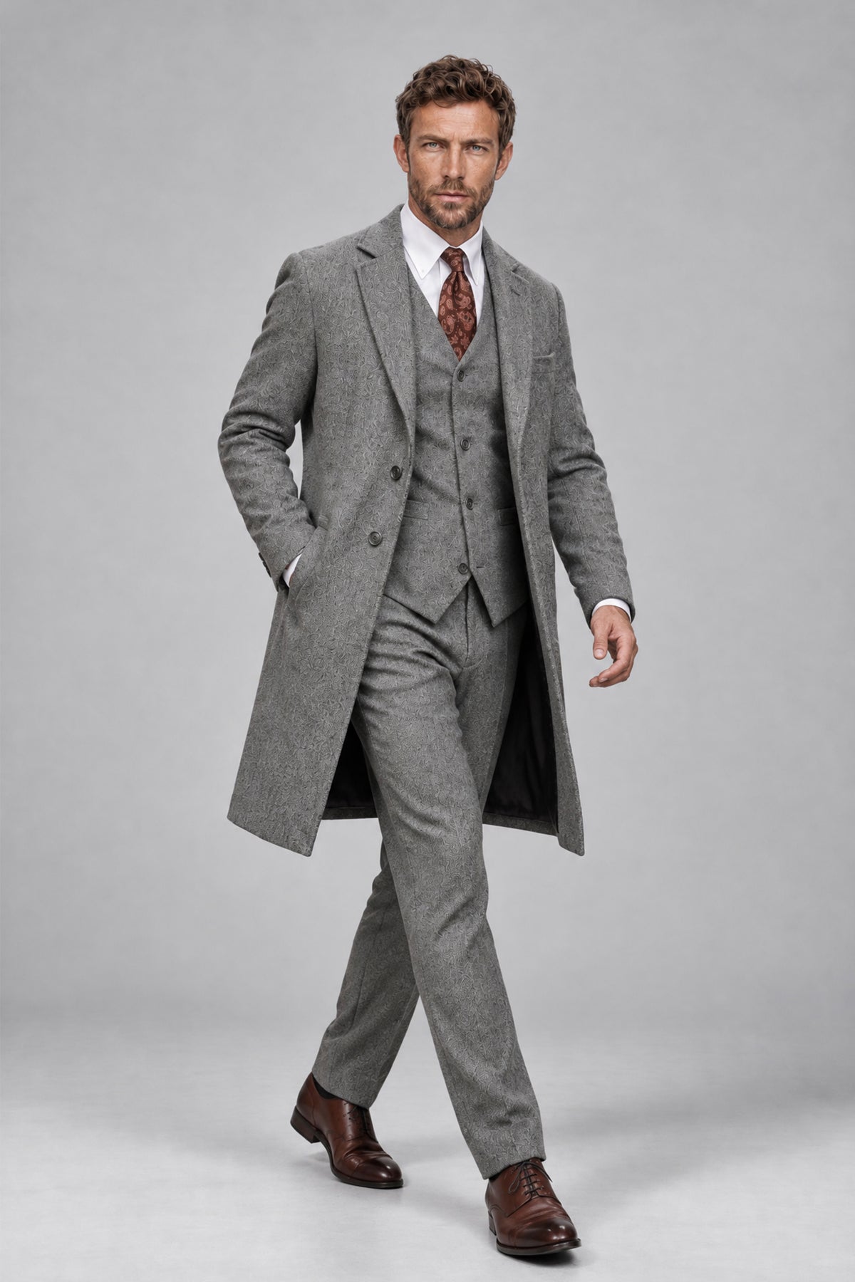 Three-quarter front view of Savile Men's Silver Grey 3-Piece Suit Set with long overcoat and matching waistcoat