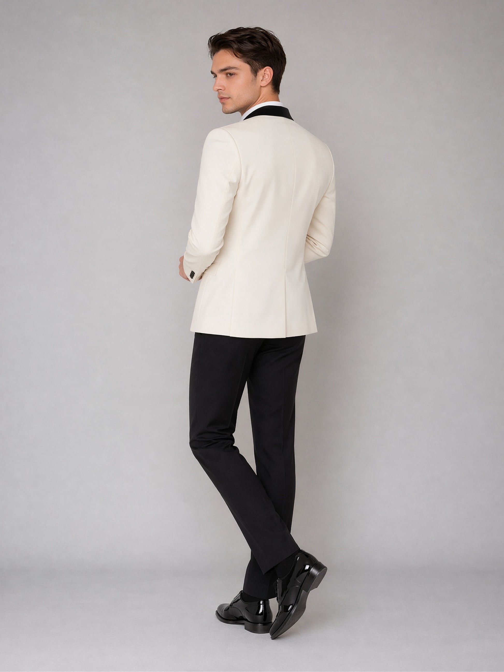 Men's ivory tuxedo suit - back view walking pose 2