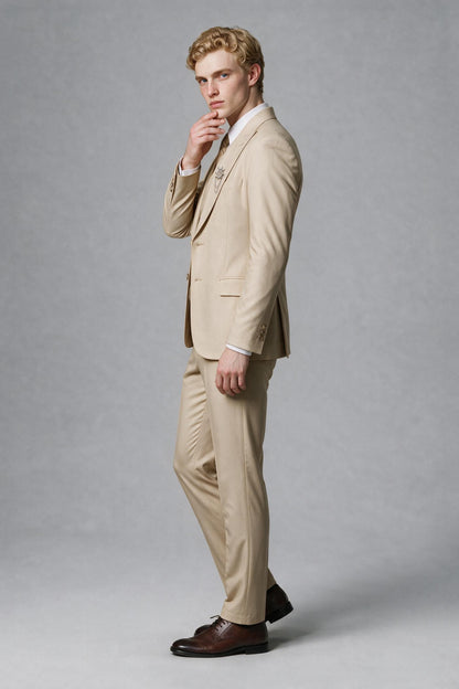 Side view of beige long-sleeve suit jacket and trousers