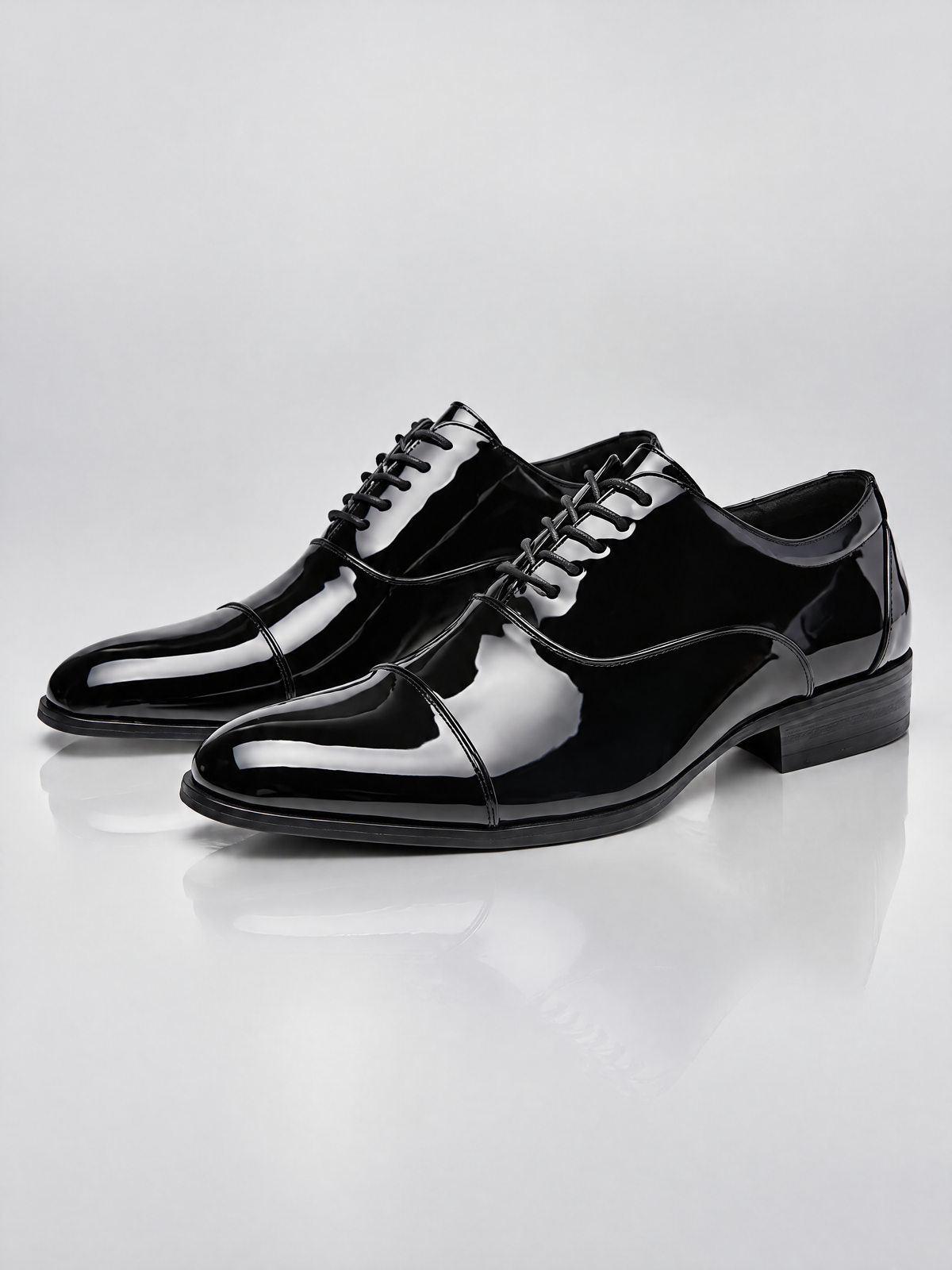Savile Men's Black Patent Leather Cap Toe Tuxedo Shoes - Architectural Plinth Display View