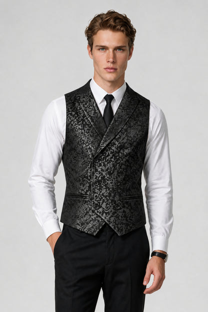 Man wearing Savile black paisley jacquard vest with peak lapel, front view