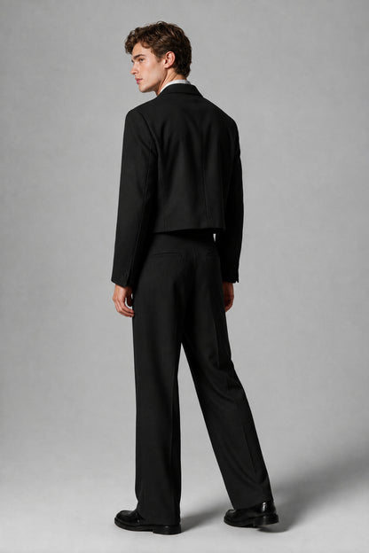 Back view of the Savile black cropped jacket and wide-leg trousers two-piece suit