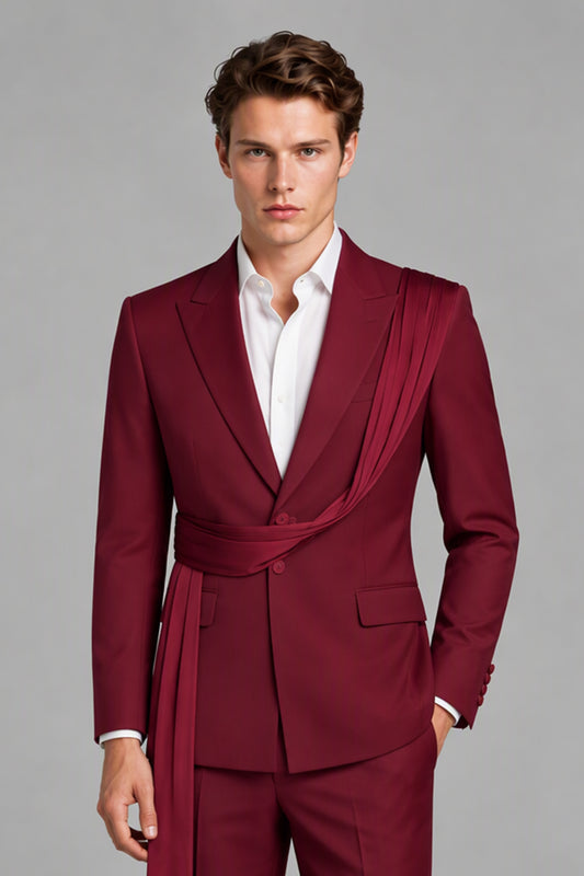 Close-up of Bolodoo burgundy suit jacket showing peak lapels and pleated draped sash