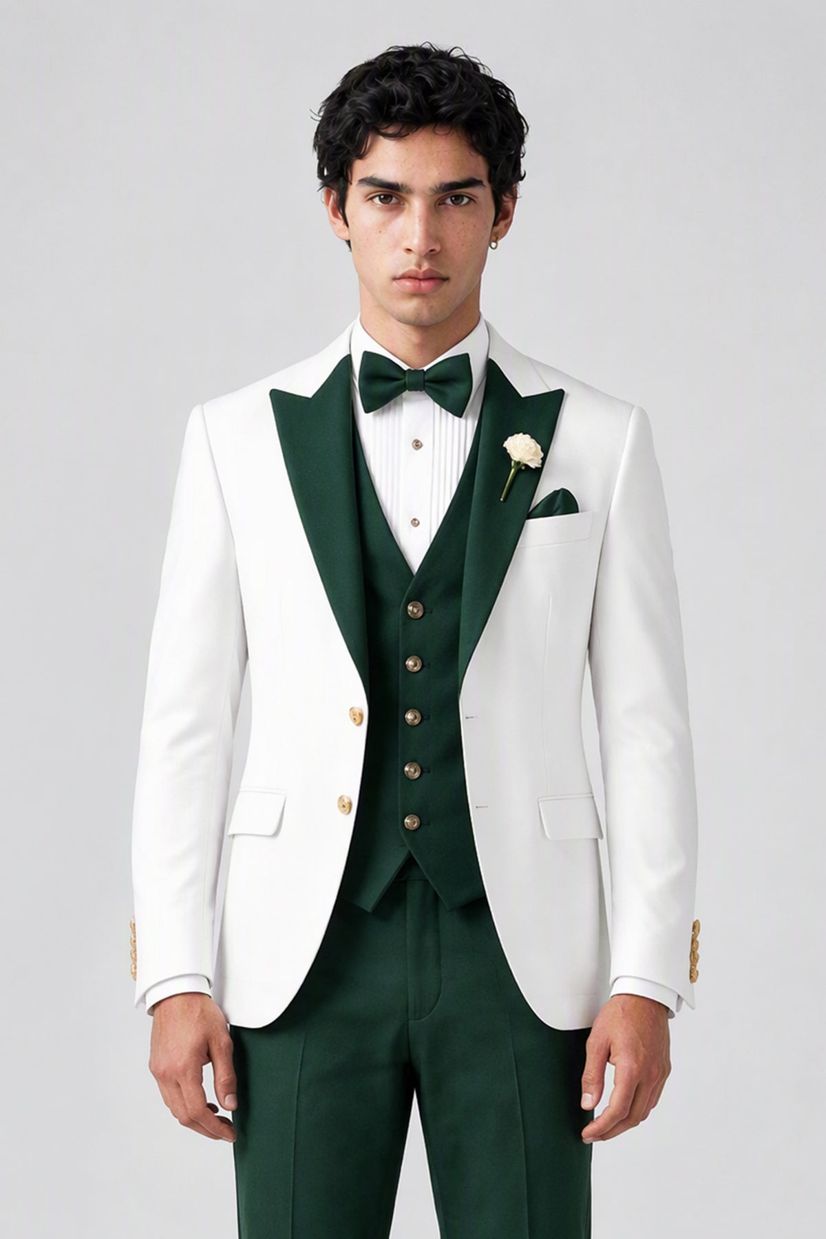 Side angled view of white jacket and emerald green trousers