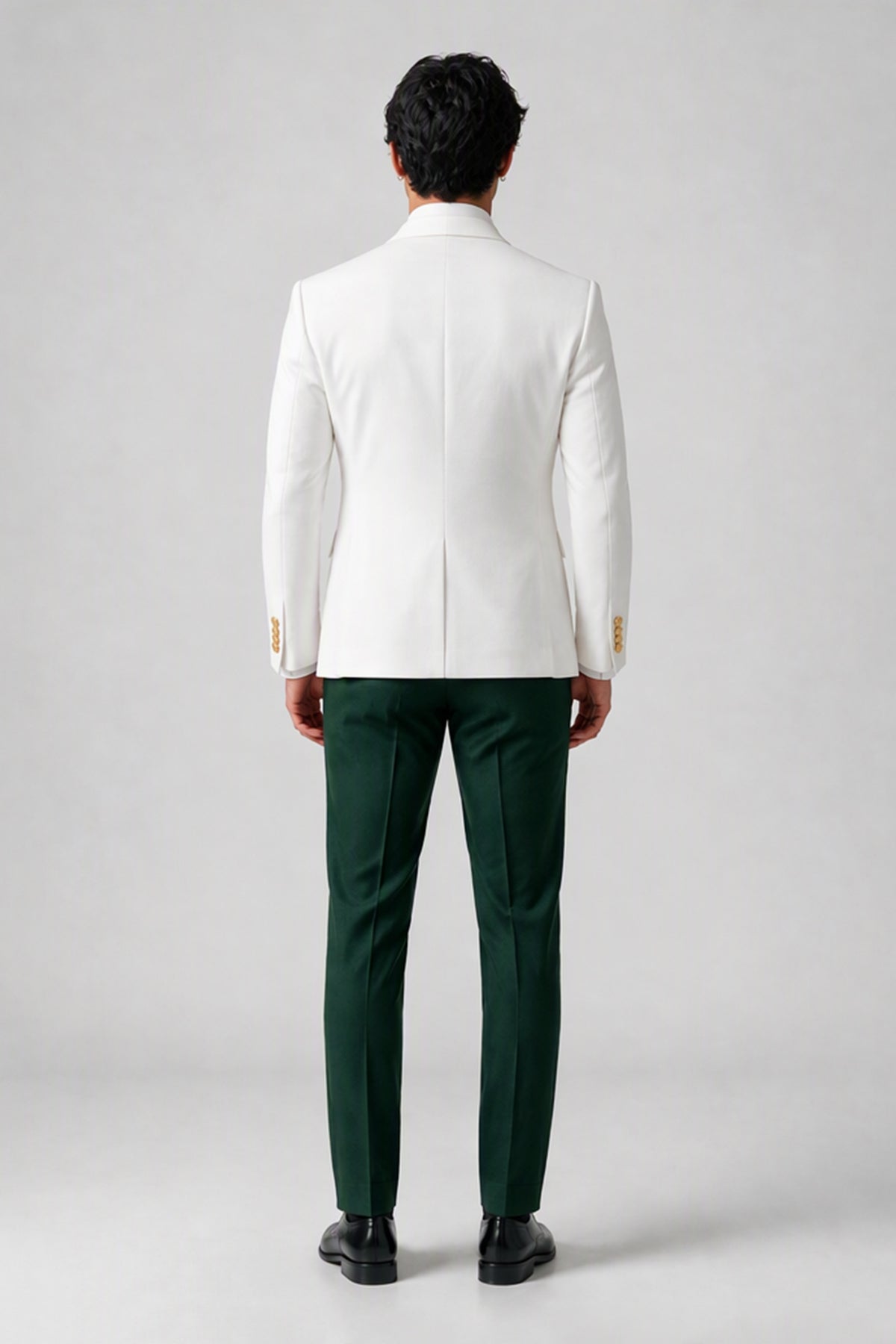Front full-length view of white jacket with emerald green lapels waistcoat and trousers