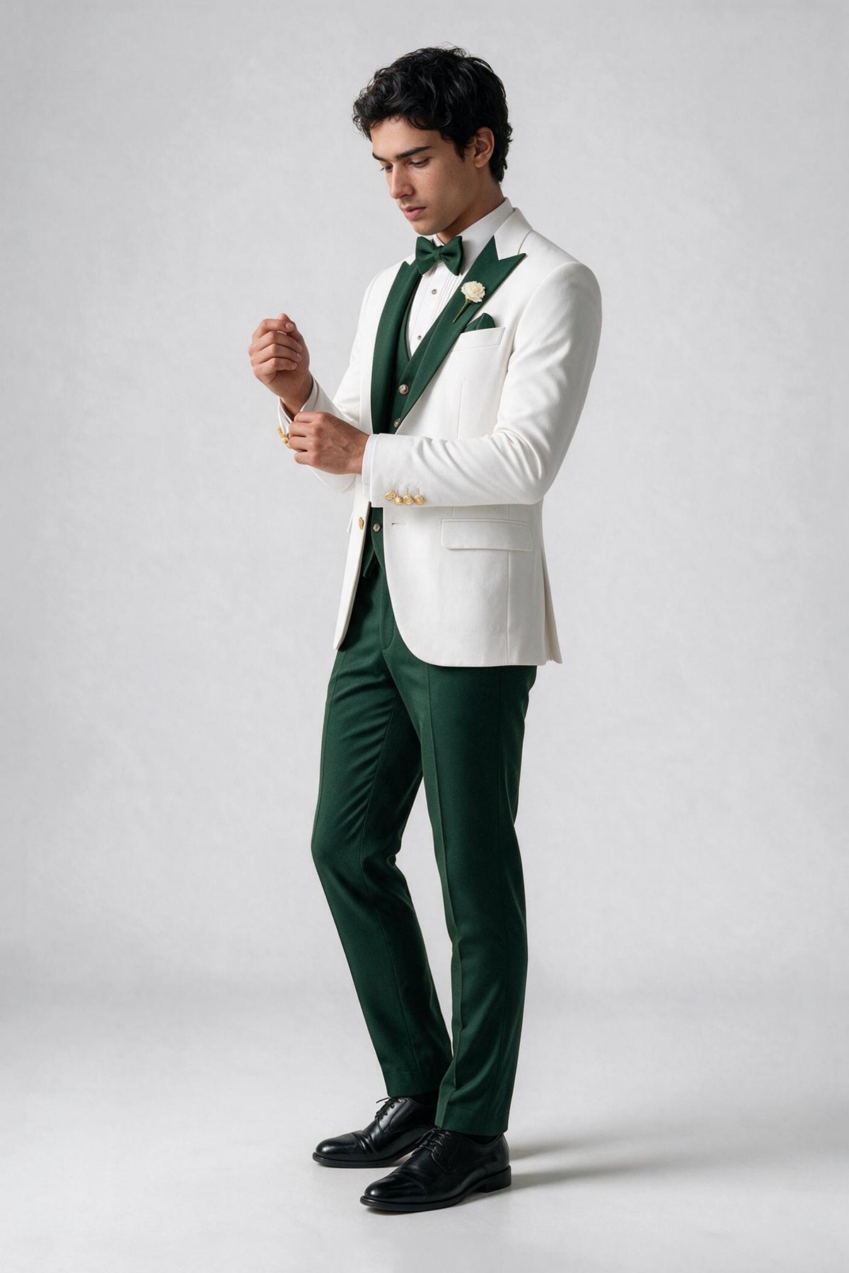 Styled full-length front view of Savile white and emerald green three-piece suit