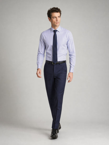 Men's navy blue suit trousers - walking pose showing full-length slim cut