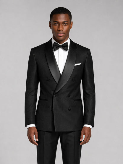 Men's black tuxedo suit - three-quarter front view with hand on jacket showing fit