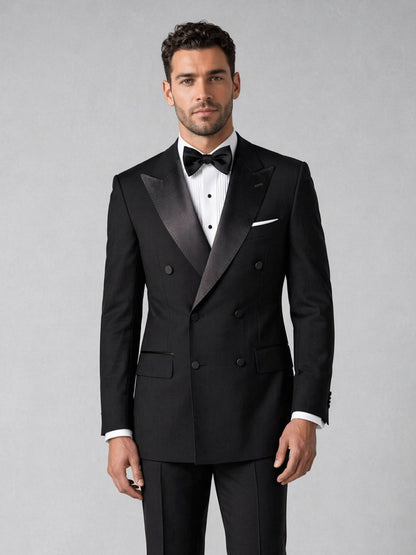 Men's black double-breasted tuxedo suit peak lapel - full length front view with white shirt and bow tie