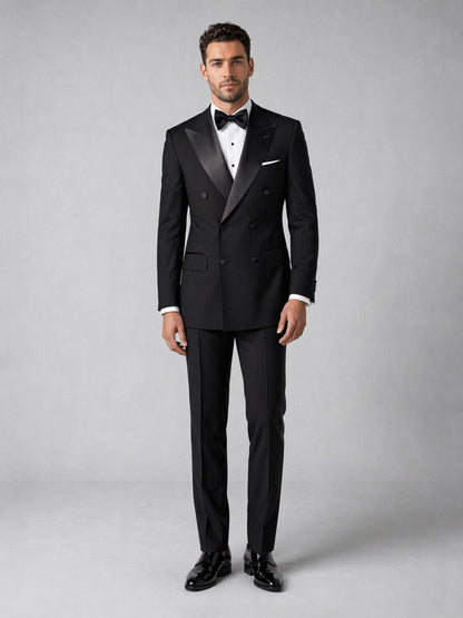 Men's black tuxedo suit - upper body side view hand on waist showing jacket structure