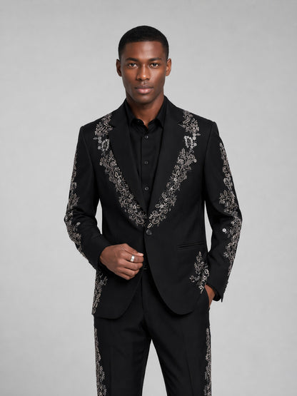Men's black floral embroidered suit - upper body close up showing silver botanical embroidery on peak lapel