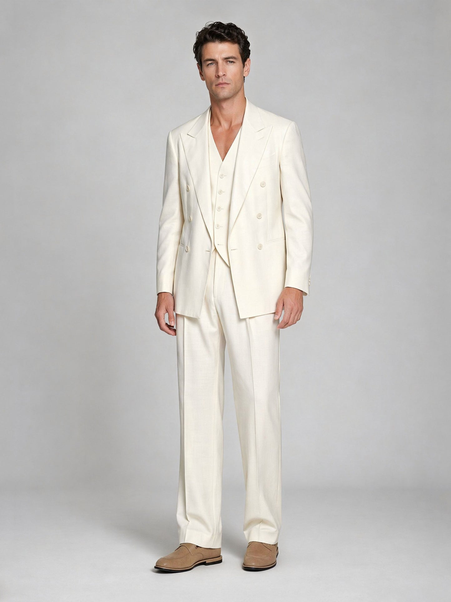 Men's ivory 3-piece suit - upper body hand touching collar showing relaxed open-collar styling