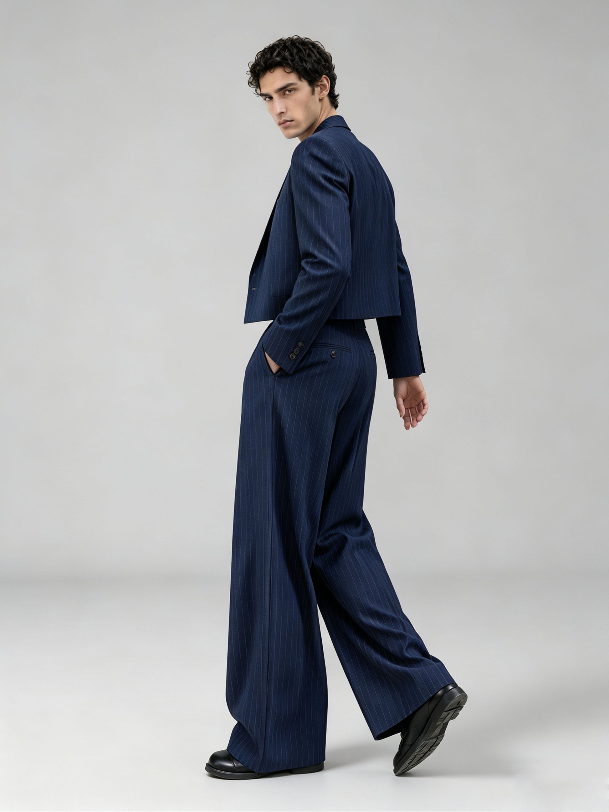 Savile GA0056 navy pinstripe suit set – model with arms crossed, showing blazer structure