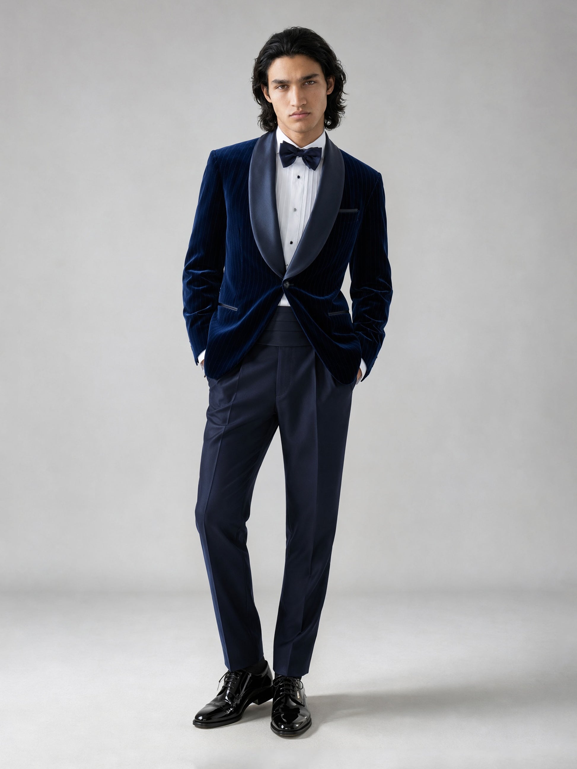 Savile GA0062 navy velvet tuxedo – upper body front view showing satin shawl lapel, pleated tuxedo shirt and navy bow tie