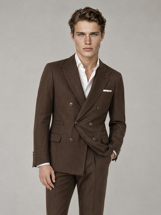 Savile GA0064 chocolate brown suit set – three-quarter side pose with navy tie showing peak lapel silhouette and slim trouser drape