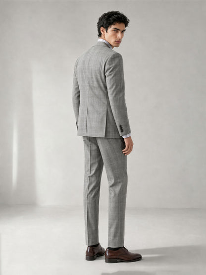 Savile GA0070 light grey glen plaid double-breasted suit – full body front view, arms crossed showing structured silhouette and windowpane check