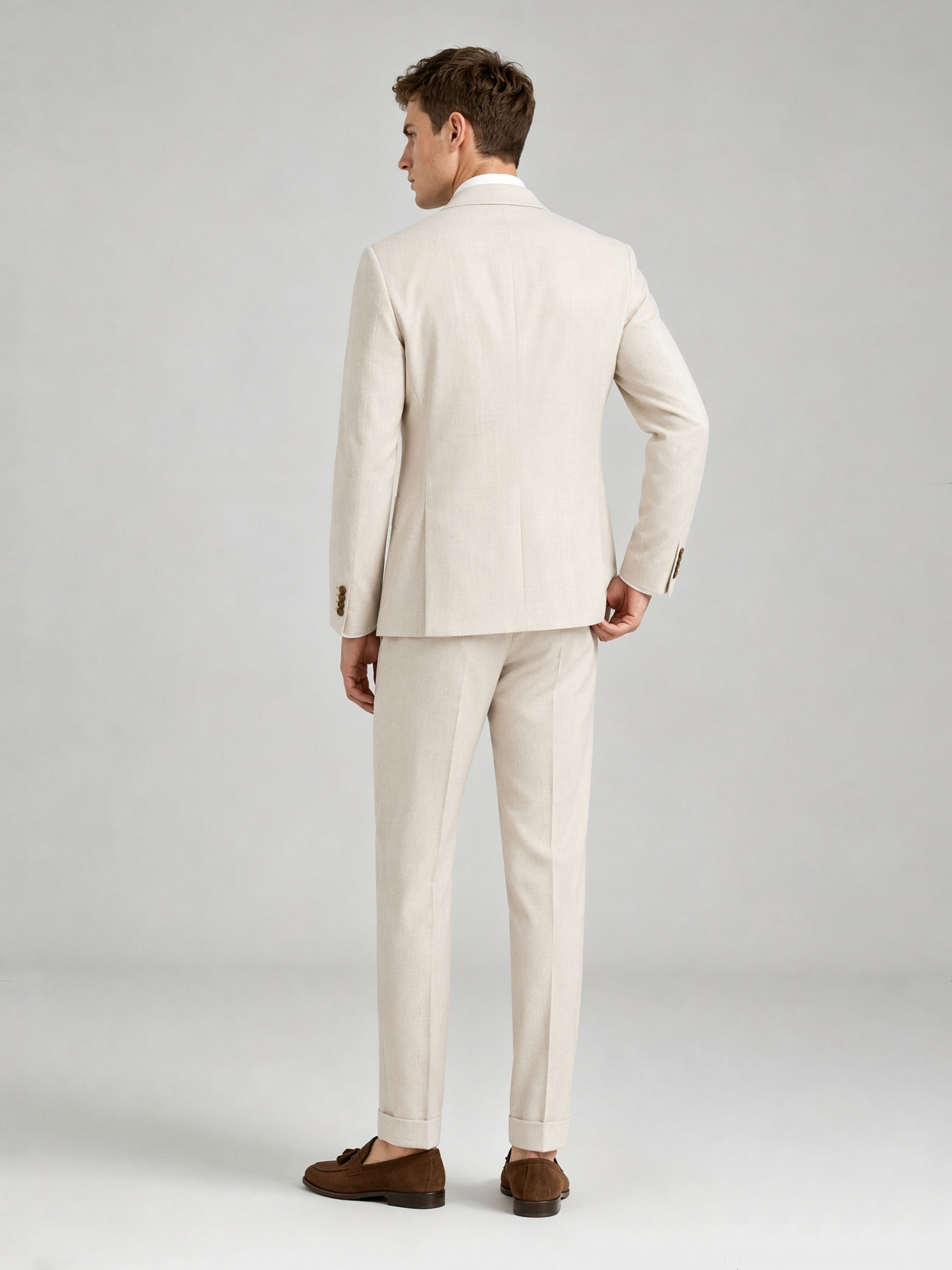 Savile GA0072 cream linen double-breasted suit – full body front view, arms crossed showing structured peak lapel silhouette and slim trousers