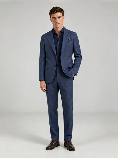 Savile GA0073 steel blue windowpane check suit – upper body front view showing notch lapel, two-button closure, navy open-collar shirt and printed pocket square