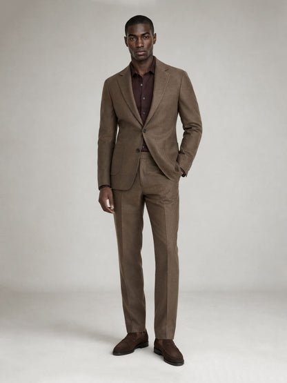 Savile GA0075 tan camel linen unstructured suit – upper body front view showing notch lapel, two-button closure and dark brown open-collar knit shirt