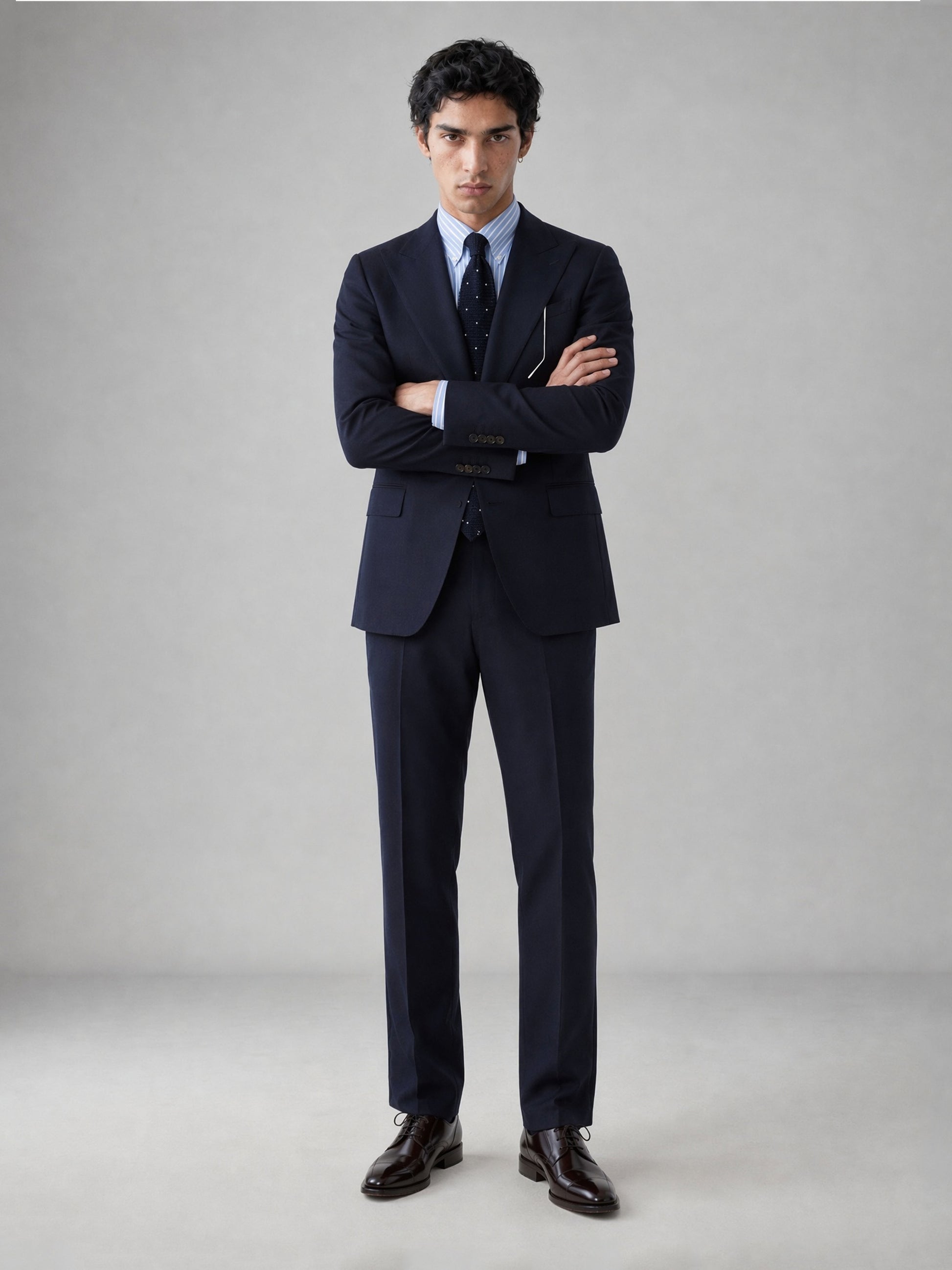 Savile GA0076 midnight navy 2-piece suit set – full body front view, hand in pocket with black cap-toe oxford shoes showing slim silhouette