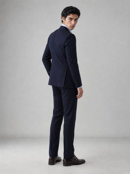 Savile GA0076 midnight navy wool suit – full body front view, arms crossed showing structured notch lapel silhouette and slim trouser drape