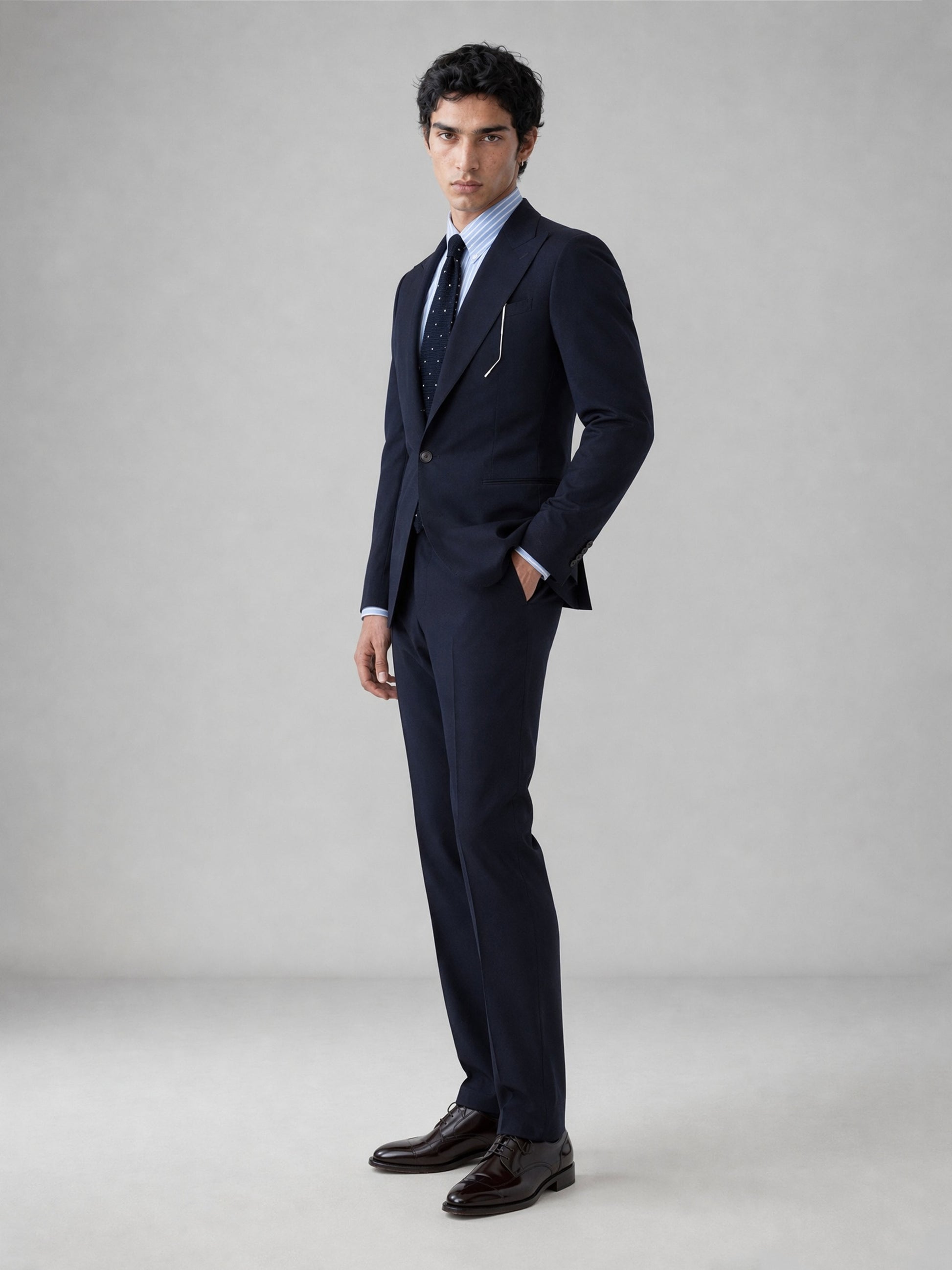 Savile GA0076 midnight navy suit set – back three-quarter view showing side vents, structured shoulders and slim trouser silhouette