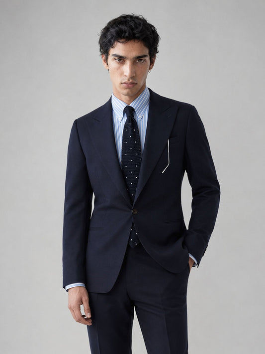 Savile GA0076 midnight navy wool 2-piece suit – full body three-quarter side pose, hand in pocket showing slim-fit silhouette and refined navy fabric