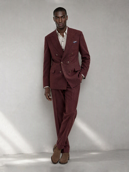 Savile GA0080 burgundy wool 2-piece suit set – full body front view, relaxed lean against wall showing slim silhouette and peak lapel detail