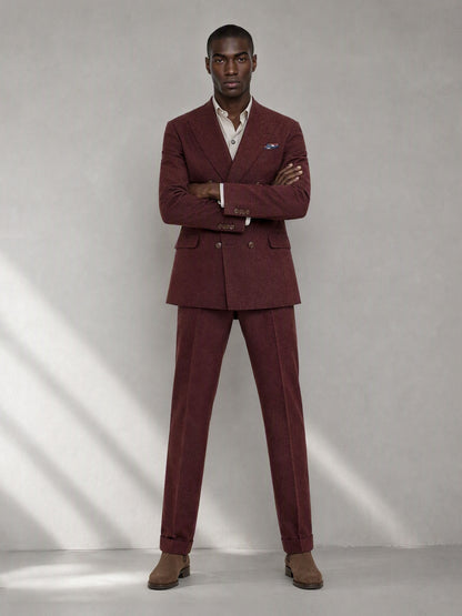 Savile GA0080 burgundy double-breasted suit – full body front view, arms crossed showing structured peak lapel silhouette and slim trouser drape