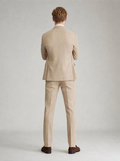 Savile GA0081 sand khaki linen 2-piece suit – back view, arms crossed showing clean center back line and slim trouser silhouette