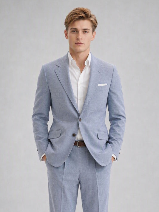 Savile GA0082 powder blue linen 2-piece suit set – full body front view, hands in pockets with white sneakers showing turn-up trouser cuffs and slim silhouette