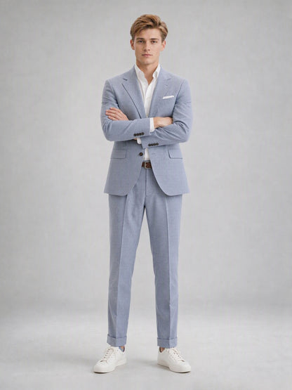 Savile GA0082 powder blue linen suit set – full body front view, single hand in pocket showing Italian drape, peak lapel profile and turn-up trouser cuffs