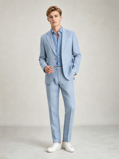 Savile GA0084 ice blue linen suit – upper body front view showing notch lapel, two gold-tone buttons, tonal blue open-collar shirt and patch pocket detail