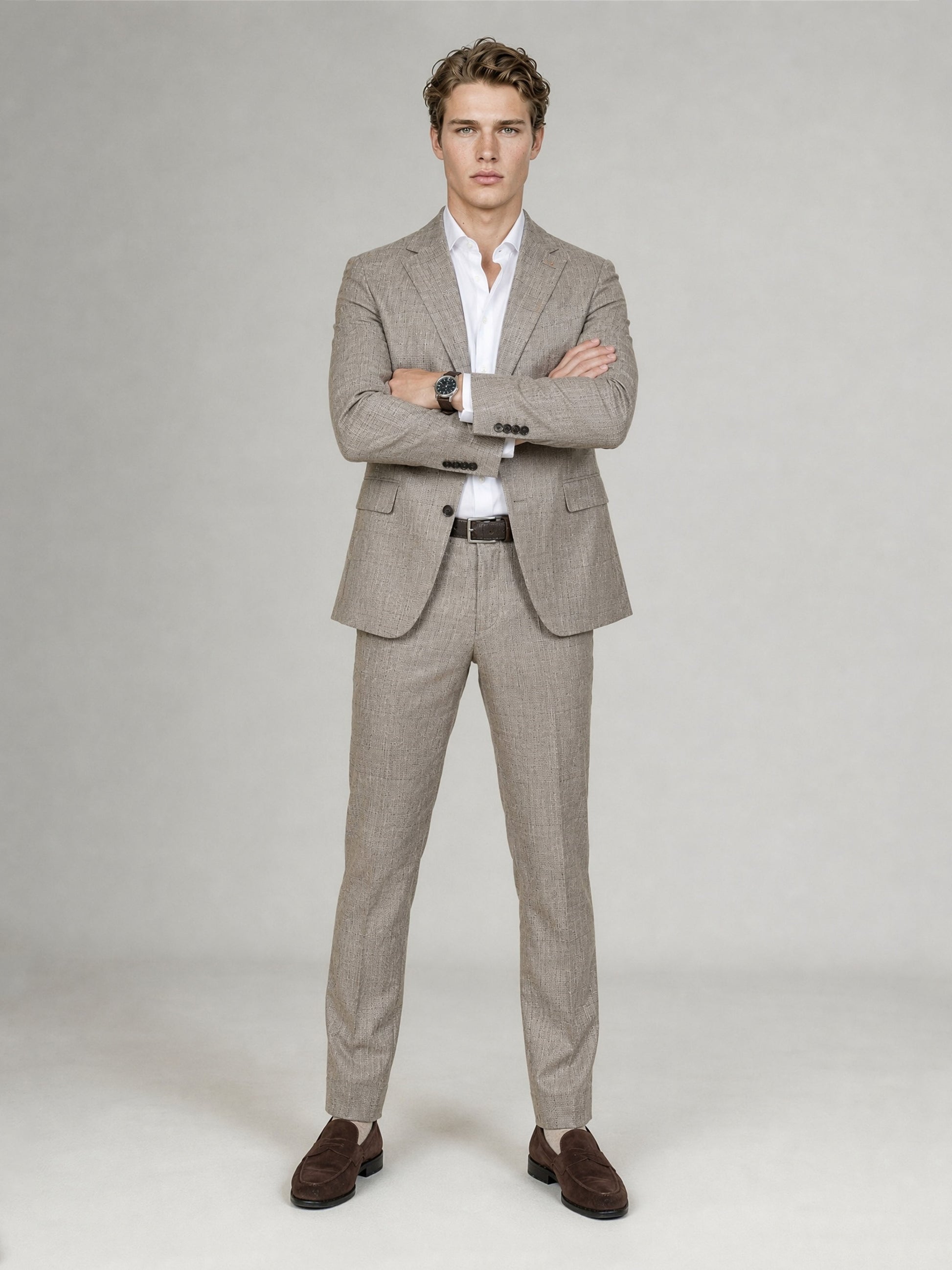 Savile GA0085 oatmeal glen plaid suit set – back view, walking pose showing side vents, structured shoulders and slim trouser silhouette with dark brown loafers
