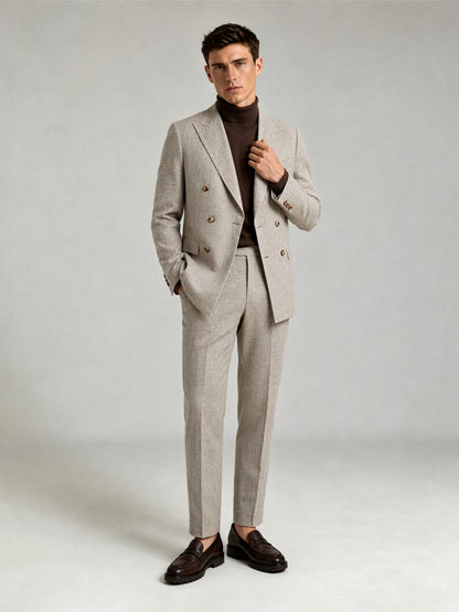 Savile GA0086 oatmeal greige check 2-piece suit set – full body front view, hands in pockets with dark brown penny loafers and brown knit tie styling