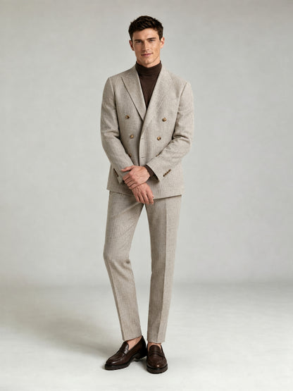 Savile GA0086 oatmeal greige double-breasted suit set – back three-quarter view, model looking over shoulder showing center vent and slim trouser silhouette