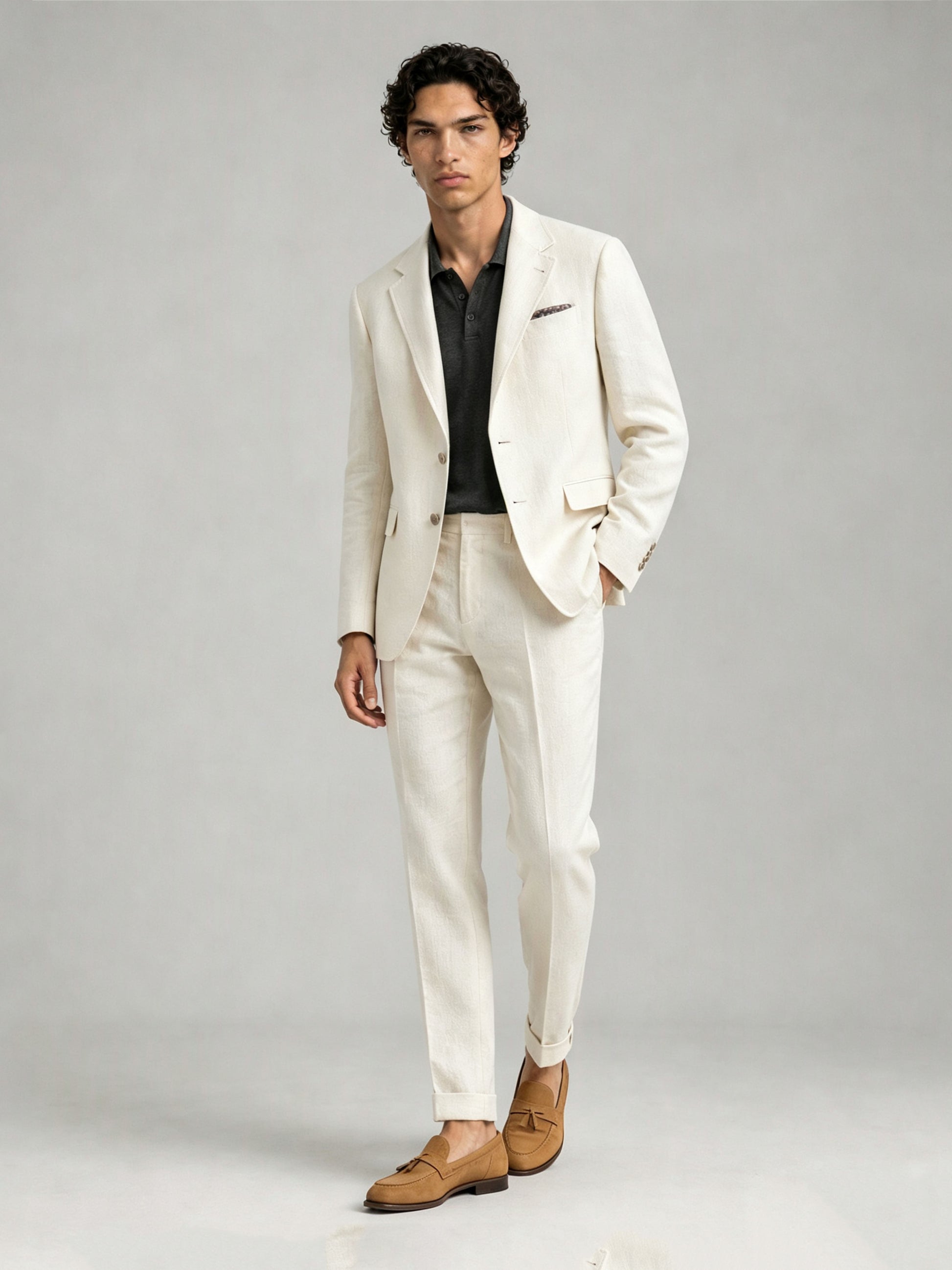 Savile GA0088 cream ivory linen suit – upper body front view showing notch lapel, two-button closure, olive green polo shirt and printed pocket square detail