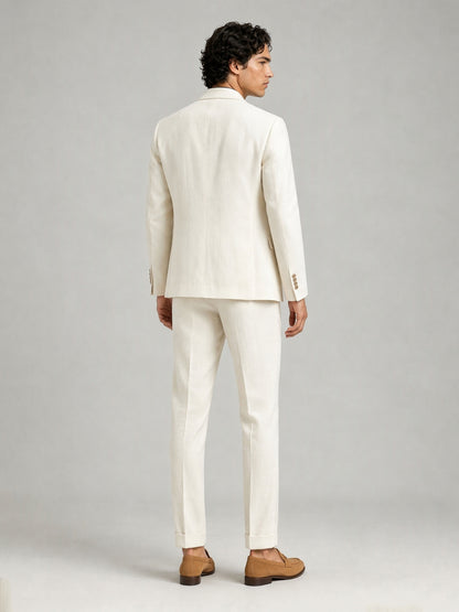 Savile GA0088 cream ivory linen suit – full body front view, hands clasped showing slim silhouette, turn-up trouser cuffs and tan suede tassel loafers
