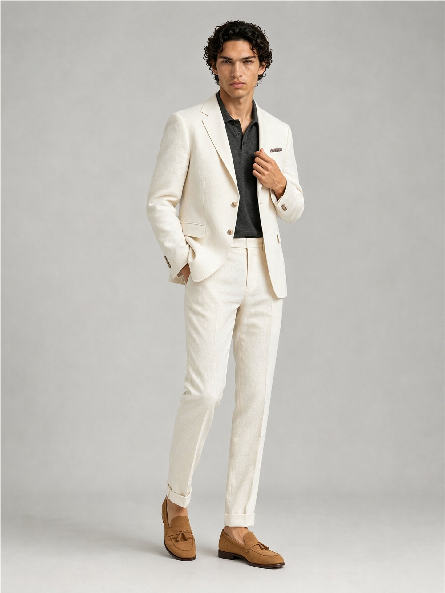 Savile GA0088 cream ivory linen suit set – back view showing side vents, structured notch lapel shoulders and slim turn-up trouser drape with tan loafers