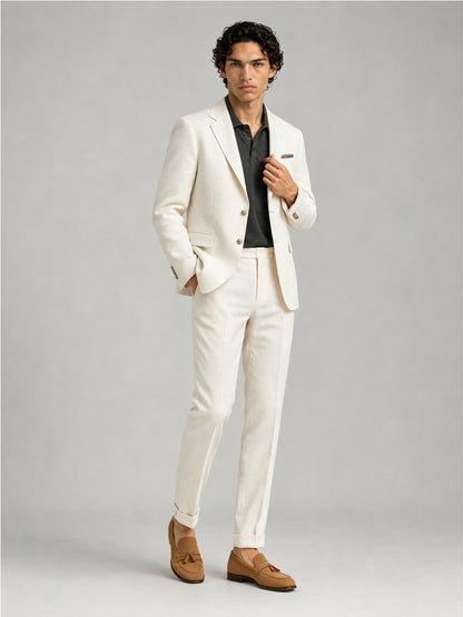 Savile GA0088 cream ivory linen suit set – back view showing side vents, structured notch lapel shoulders and slim turn-up trouser drape with tan loafers