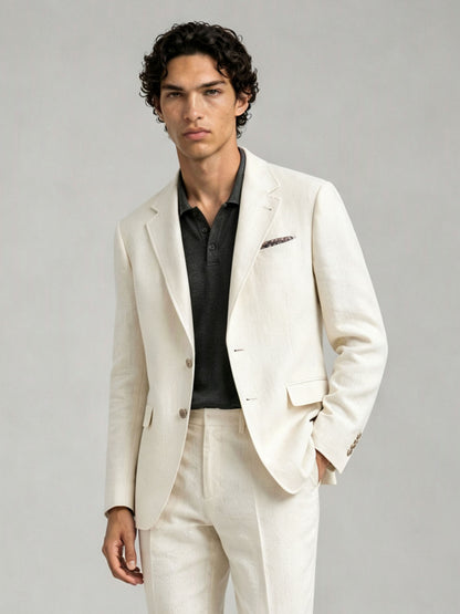 Savile GA0088 cream ivory linen 2-piece suit – full body front view, hand touching lapel showing Italian drape, notch lapel profile and turn-up trouser cuffs