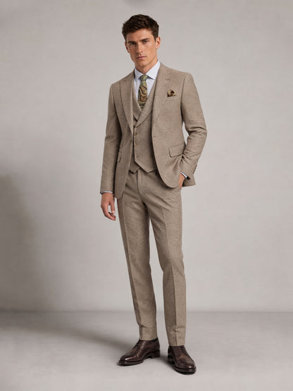 Savile GA0091 warm sand micro-check 3-piece suit – upper body front view showing notch lapel, waistcoat, light blue shirt, green paisley tie and gold pocket square