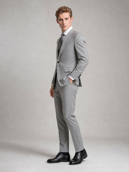 Savile GA0092 light grey suit – full body three-quarter side pose, hands in pockets showing Italian tailoring silhouette and slim trouser profile