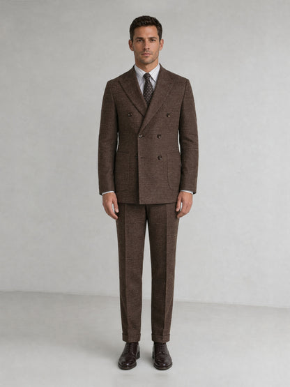 Savile GA0093 tobacco brown check wool 2-piece suit set – full body front view, hand touching lapel in relaxed side pose showing Italian drape and slim trouser silhouette