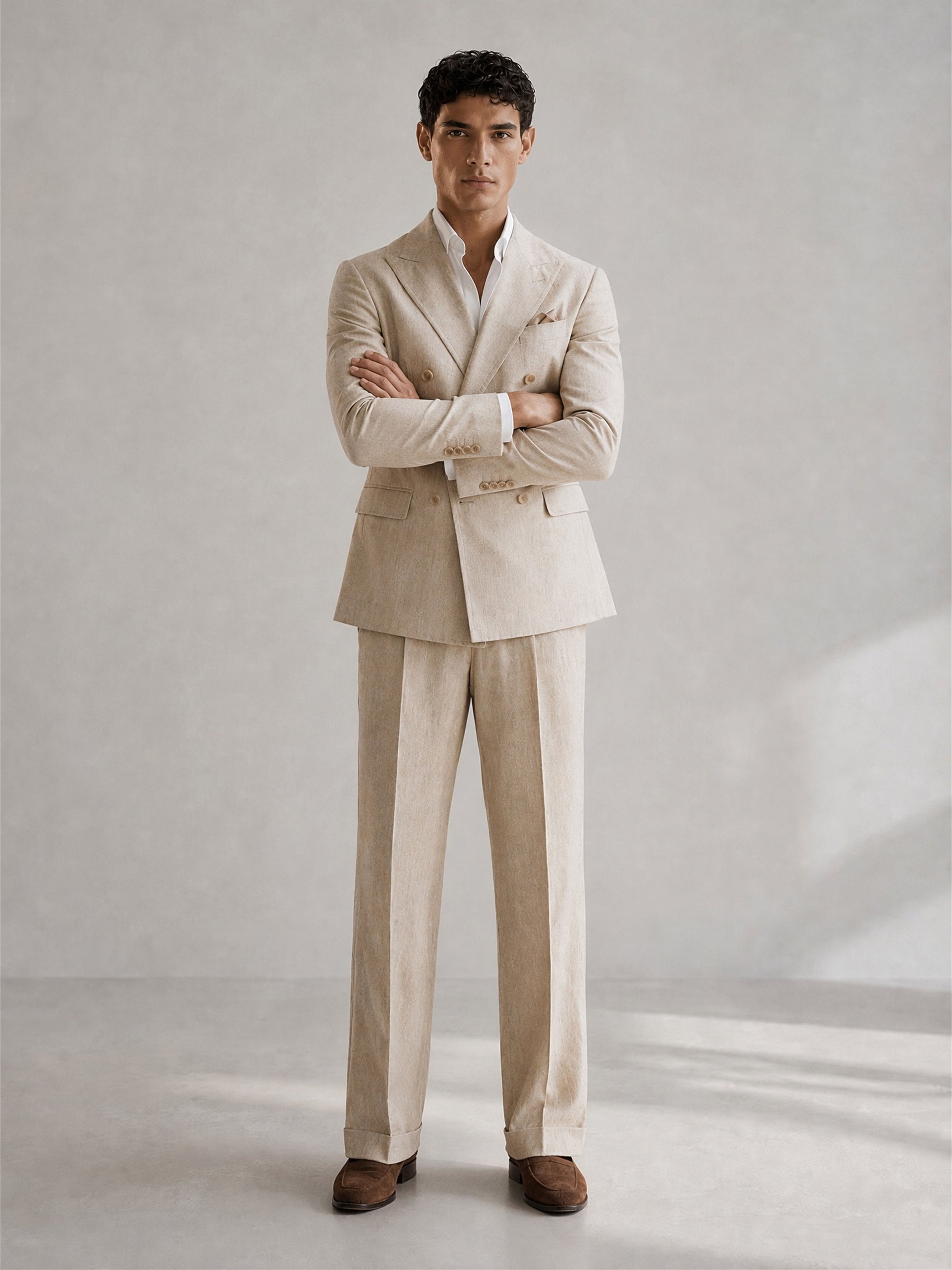 Savile GA0094 natural beige linen 2-piece suit set – full body front view, both hands in pockets with dark brown suede loafers showing wide-leg turn-up trousers