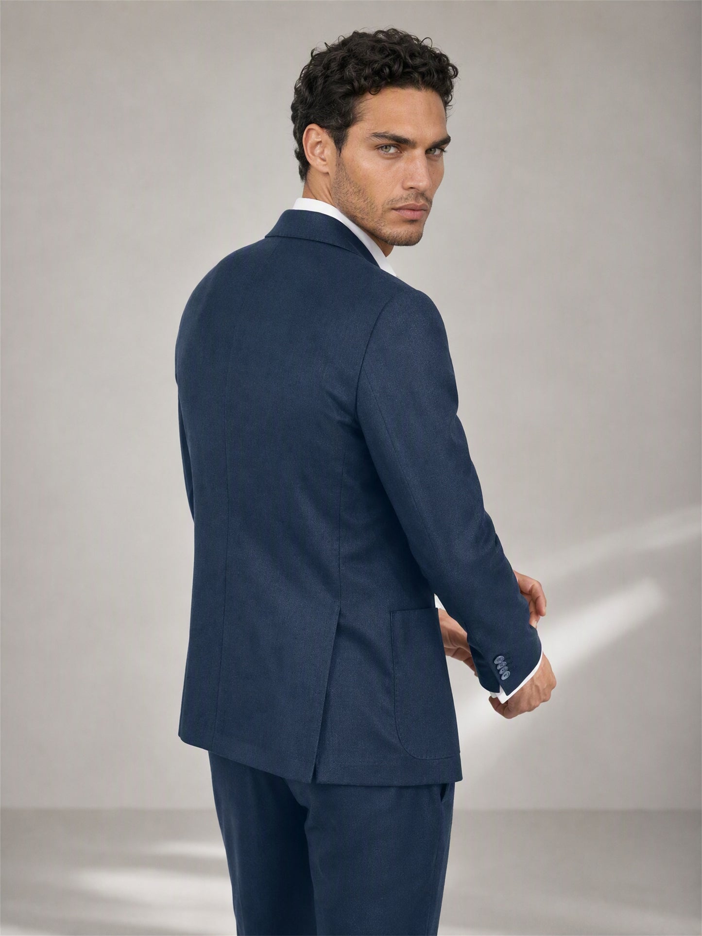 Savile navy linen suit – upper body detail, jacket lapel and buttons